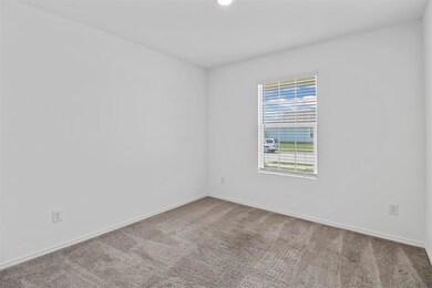 Empty room with baseboards, recessed lighting, and