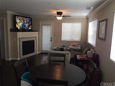 Family Room - Fireplace, Crown Molding And Hardwoo