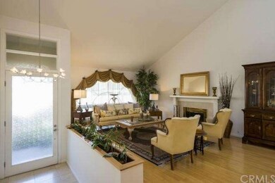 Inviting entry offers custom design door, marble e