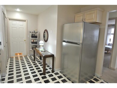 Kitchen also has pantry closet.  The door leads to