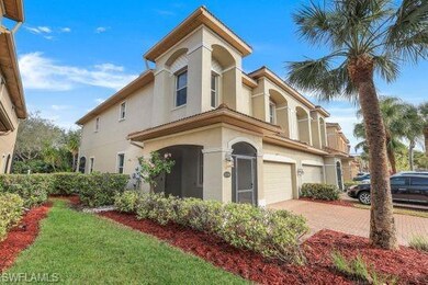 Mediterranean / spanish-style house featuring a ga