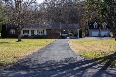 Nice paved driveway and parking area.