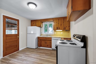 The kitchen is located at the back left hand side