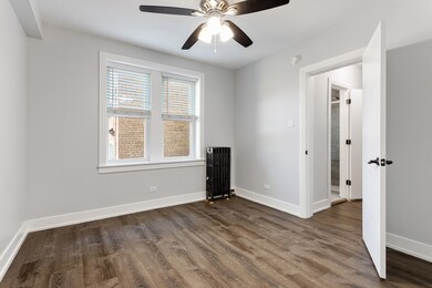 1521 W Sherwin Ave unit 408, Chicago, IL 60626 - photo 7