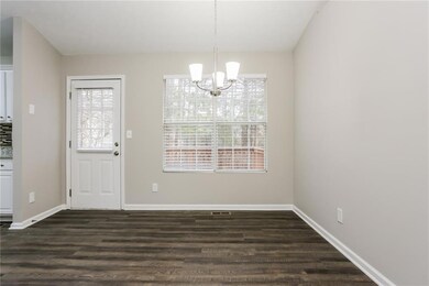 Unfurnished dining area featuring an inviting chan