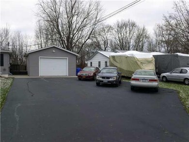 Exterior Front. Check out the size of the driveway
