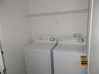 laundry room off of kitchen and garage, has a pant