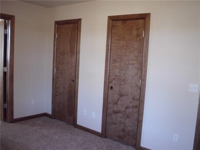 Master bed has his and her closets