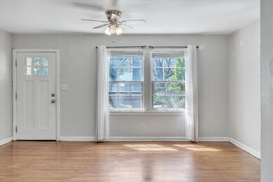 Foyer featuring ceiling fan, light hardwood / wood