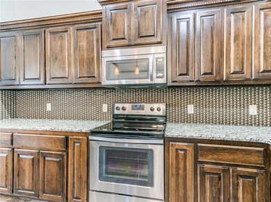 Kitchen:  A pantry, stainless appliances (includin