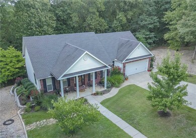 Nicely landscaped all around this gorgeous dream home!