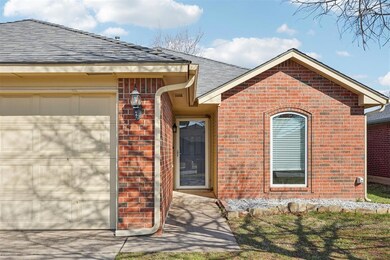 Property entrance with a garage