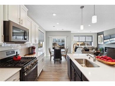 Plenty of space to maneuver around the kitchen. Photo of model home, colors and finishes will vary.