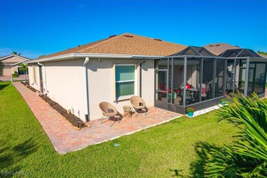 Back of house with extended screened and unscreene