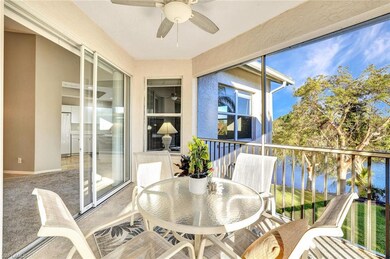 Sunroom / solarium with ceiling fan and a water vi