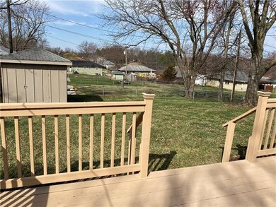 View Of Fenced Backyard From Deck