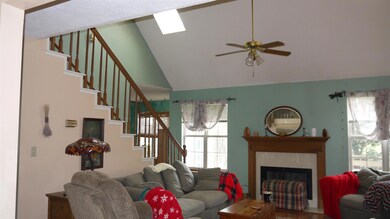 Soaring ceilings with skylights in the living room