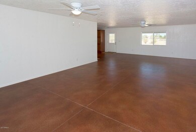 6  24230 E Cholla Rd