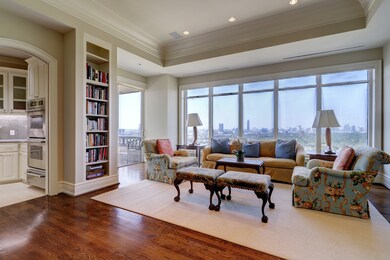 The living area opens onto the balcony.