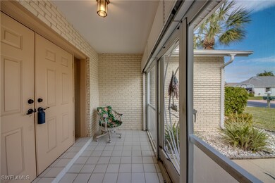 Tiled Front Porch with Double Door Entry + Hurrica
