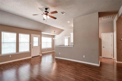Wonderful living room opens to kitchen and breakfast room.