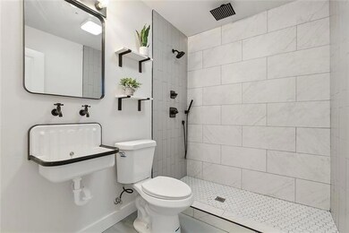 The spa-inspired bath is a true standout, featurin