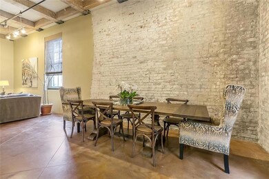 Dining area with the brick wall accent.