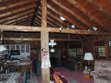 View of great room from hall by bedrooms, creating