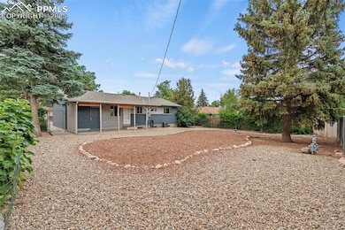 Back of property with stucco siding