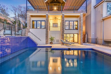 Pool featuring a patio area and fence