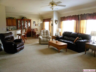 The Living Room also has a wall of windows overloo