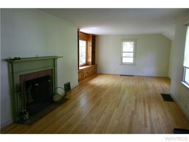 Living Room Built in cabinets & shelves at one end