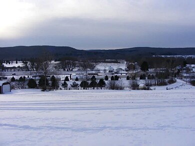 View. from front of garage looking across the vall