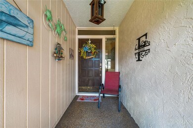 Covered and screened front porch