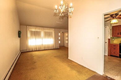 Formal Dining room. Ideal for entertaining large gatherings for special occasions and holidays.