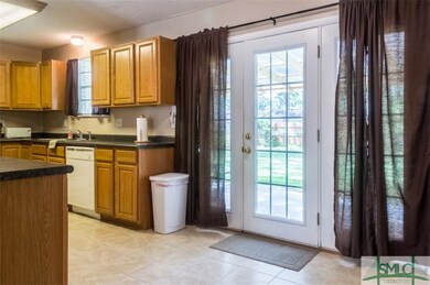 Kitchen and french doors to backyard