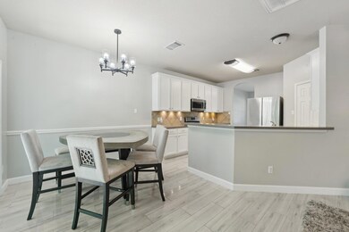 Dining space featuring light wood-style flooring,