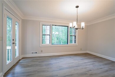 Spare room with ornamental molding, a notable chan