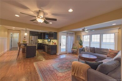 Large open living room looking to kitchen