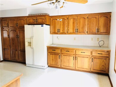 Kitchen with large built in pantry to the left of 