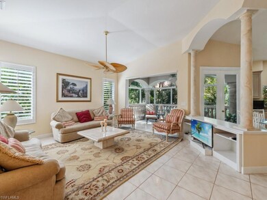Living room with light tile patterned floors, visi