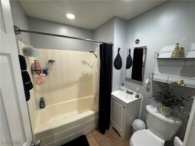 Bathroom with tile patterned flooring, shower / ba