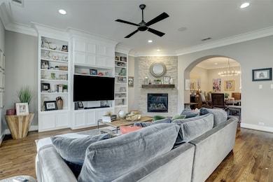 Viewed from the front windows, the living room sho