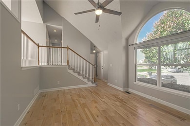 Soaring ceiling that let's everyone to be within an earshot or conversation!!  This home has been well loved and ready for a new homeowner!