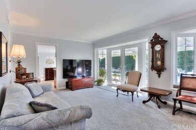 The Family Room has French doors to the covered pa