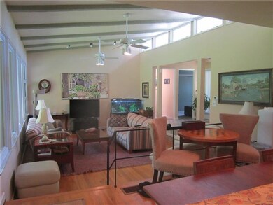 Dining room with view of living room/ more windows