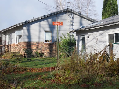 21-1298, house, gar at 6670 Florence 11-