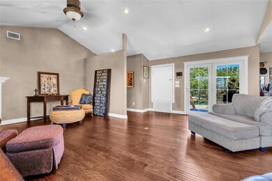 Living room featuring ceiling fan, high vaulted ceiling, baseboards, dark wood finished floors, and recessed lighting