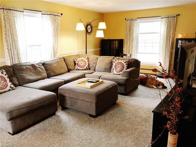 Spaciously warm and inviting living room.  Open fr