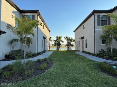 View of yard with a water view